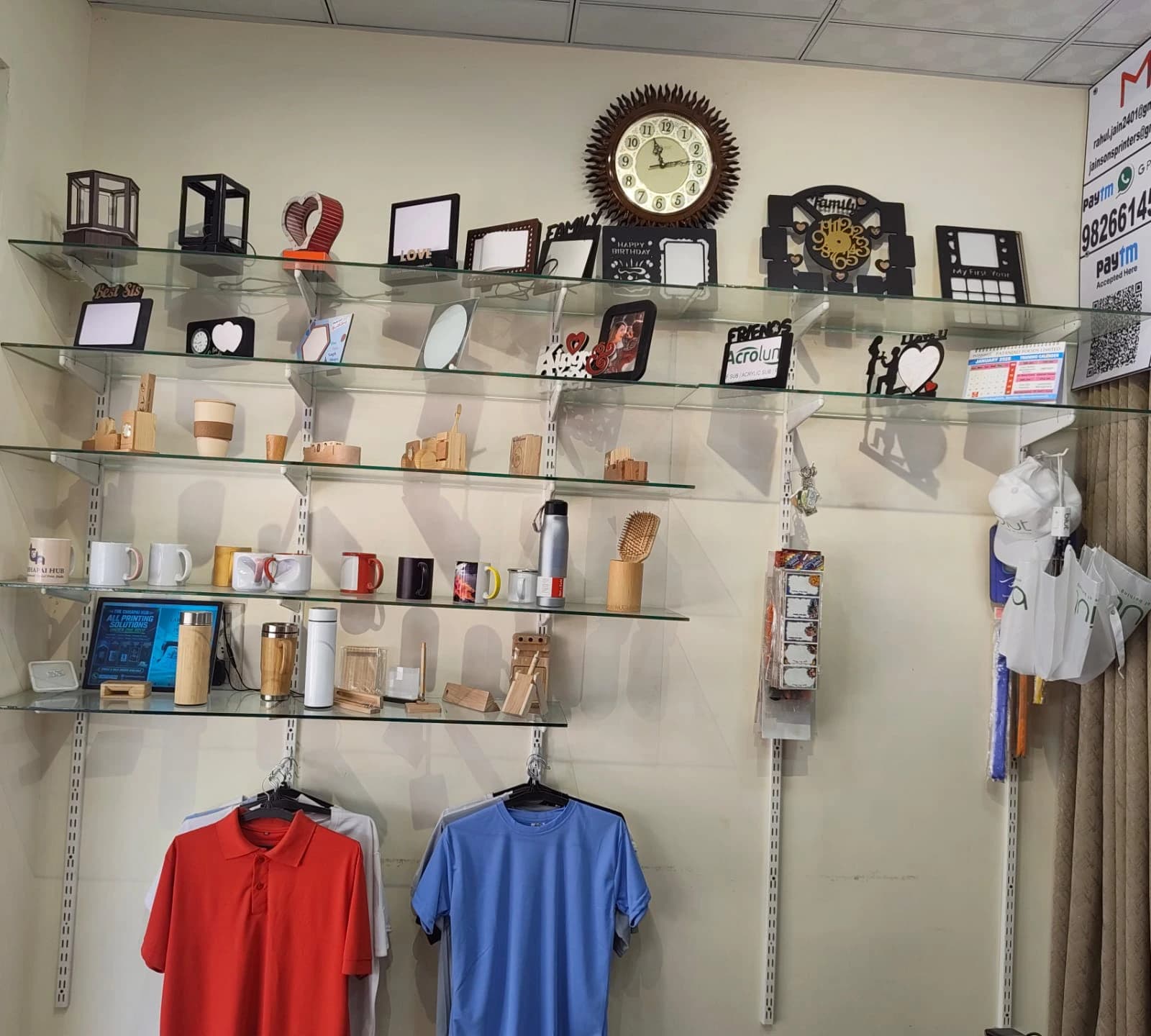 The Chhapai Hub studio display with custom printed mugs, wooden frames, bottles, and personalised gifts
